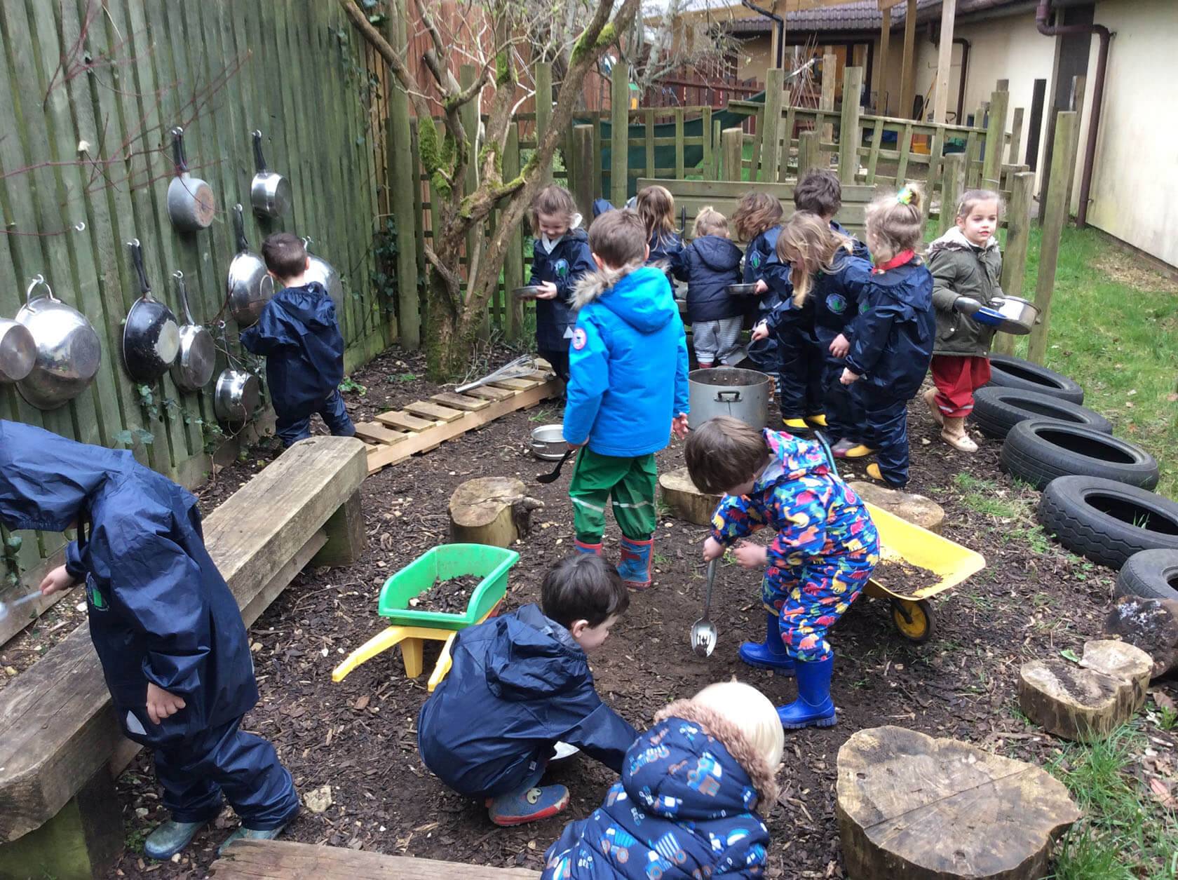 Marshfield Pre-School children at play outside in our allotment garden